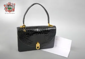 Delvaux vintage top handle handbag in alligator leather 1980