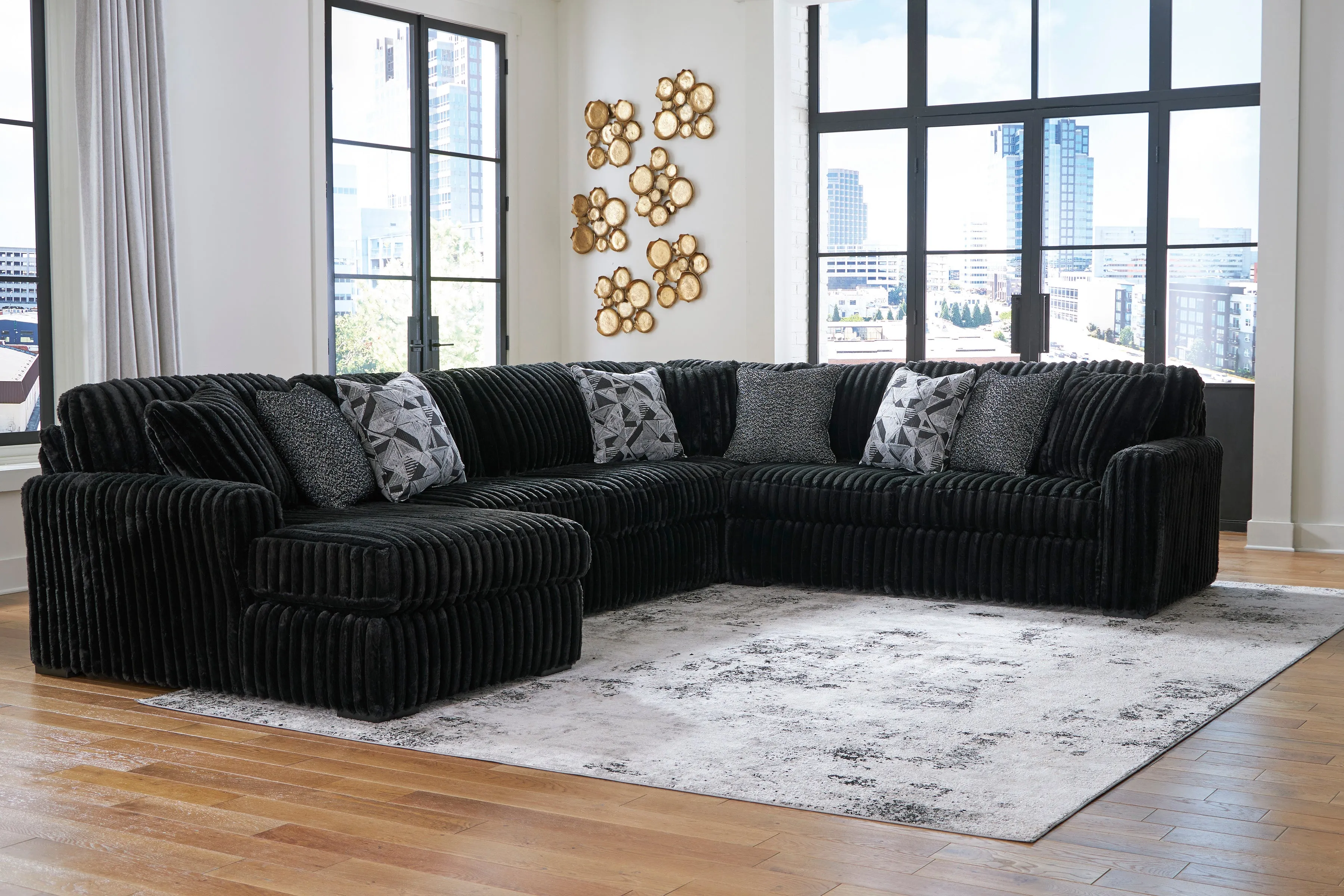 Midnight-Madness 4-Piece Sectional with Ottoman in Onyx